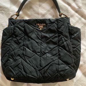 Early 2000s Black and gold Prada bag